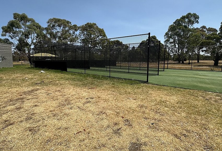 Open sports grounds and surrounding trees in Bundoora Park